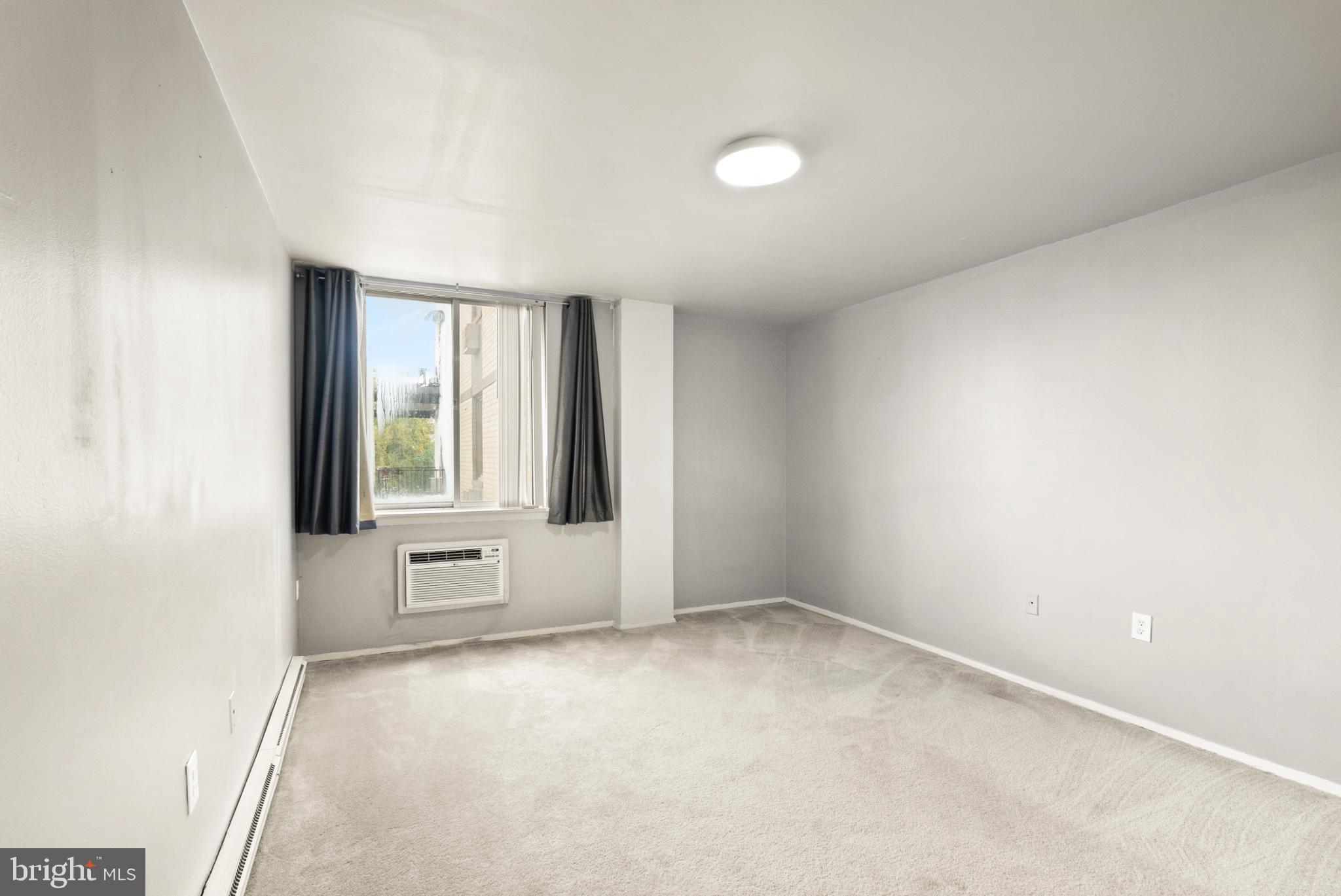 3245 Rio Drive, Unit 608 Falls Church, VA 22041 - Photo 35 of 40 an empty room with windows