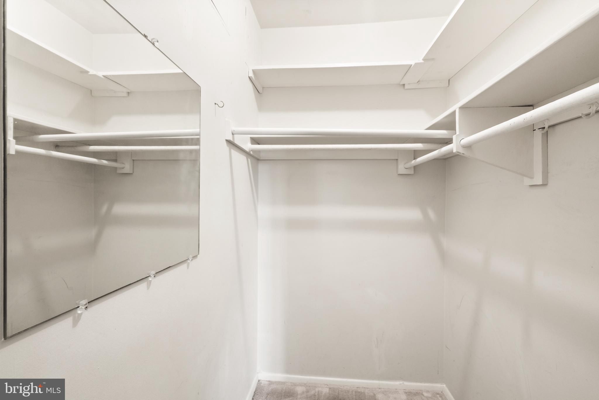 3245 Rio Drive, Unit 608 Falls Church, VA 22041 - Photo 40 of 40 a view of walk in closet with empty racks