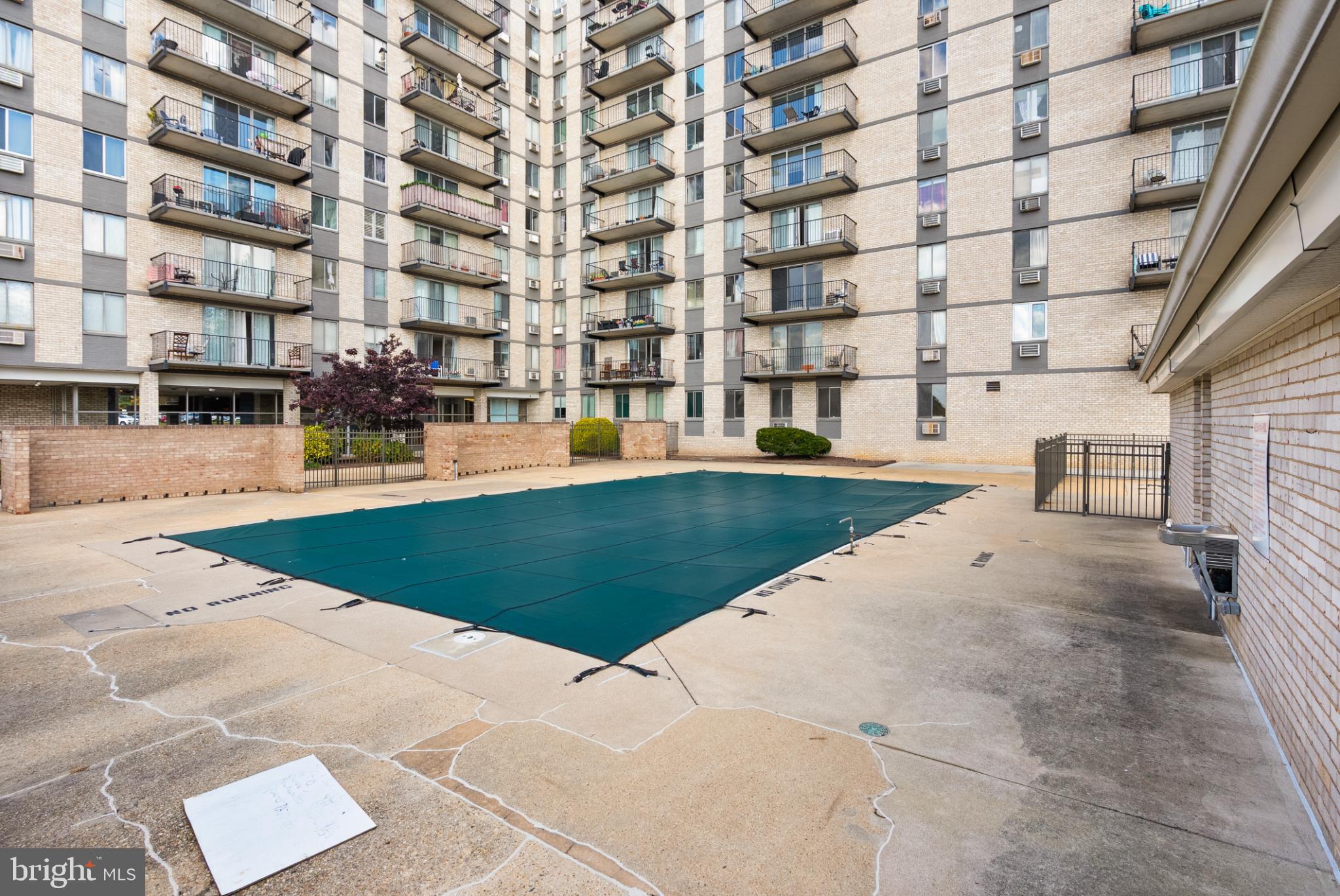 3245 Rio Drive, Unit 608 Falls Church, VA 22041 - Photo 4 of 40 a view of a building with yard