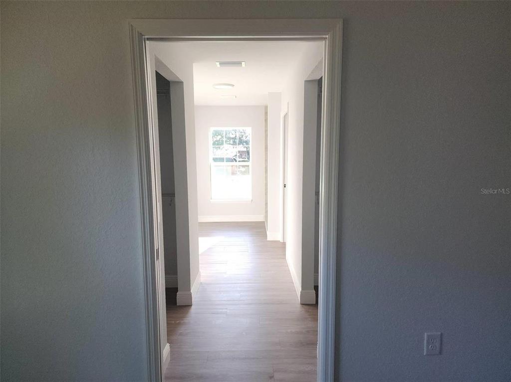 1111 Dagmar Avenue Spring Hill, FL 34606 - Photo 18 of 27 a view of a hallway