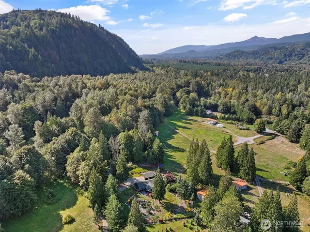 a view of a city with mountains in the background