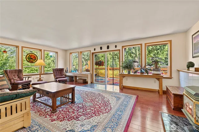 a living room with furniture and a rug