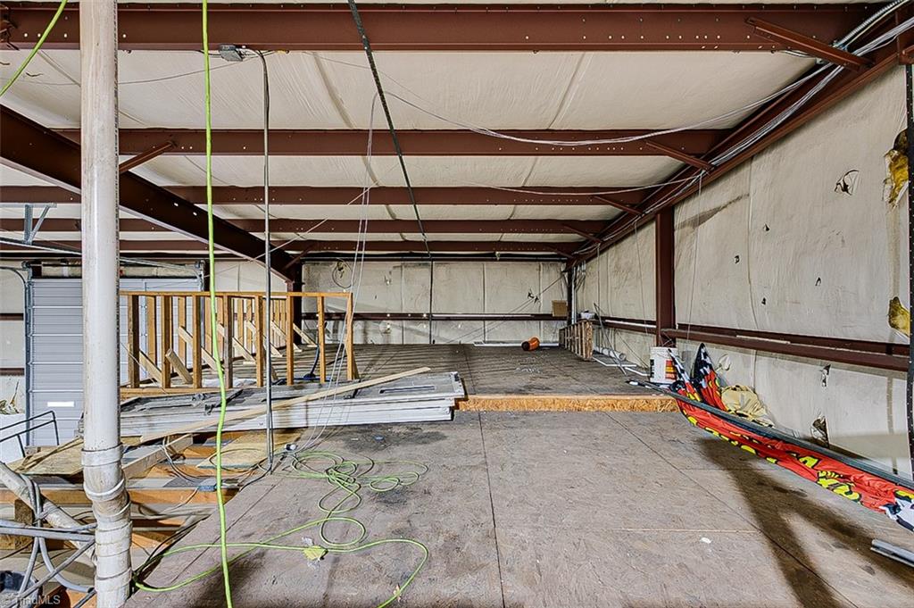 174 Lewallen Road Asheboro, NC 27205 - Photo 18 of 23 Storage above office area