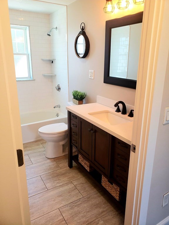 18 Harvard Road Dennis, MA 02639 - Photo 14 of 32 a bathroom with a sink and a mirror