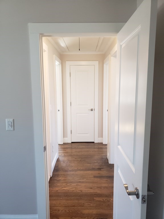 18 Harvard Road Dennis, MA 02639 - Photo 18 of 32 a view of a hallway with wooden floor