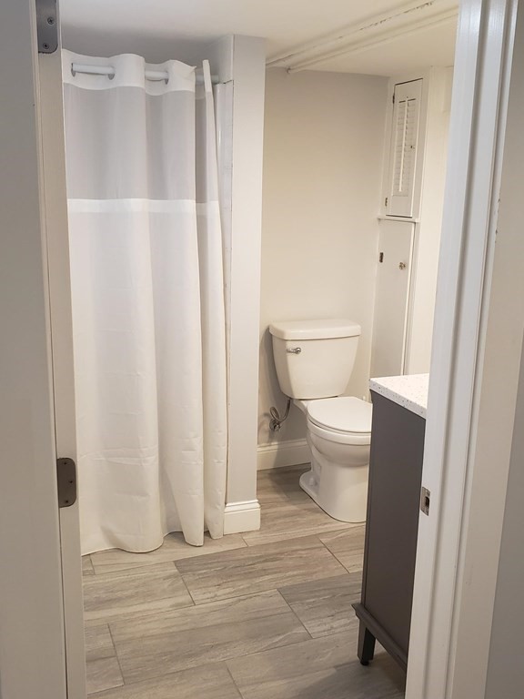 18 Harvard Road Dennis, MA 02639 - Photo 22 of 32 a bathroom with a toilet and a shower