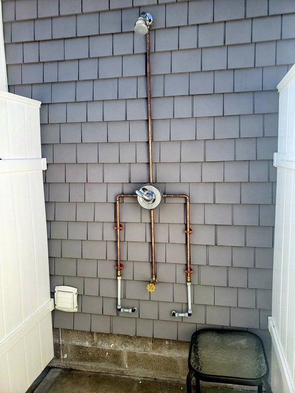 18 Harvard Road Dennis, MA 02639 - Photo 4 of 32 a bathroom with a sink