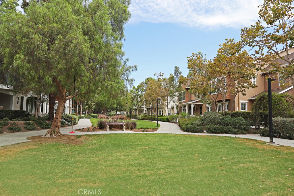 9 Orange Blossom Circle Ladera Ranch, CA 92694 - Photo 19 of 24 a view of a house with a backyard