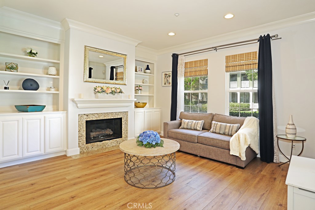 9 Orange Blossom Circle Ladera Ranch, CA 92694 - Photo 5 of 24 a living room with furniture and a fireplace