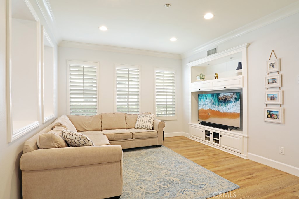 9 Orange Blossom Circle Ladera Ranch, CA 92694 - Photo 6 of 24 a living room with furniture and a flat screen tv