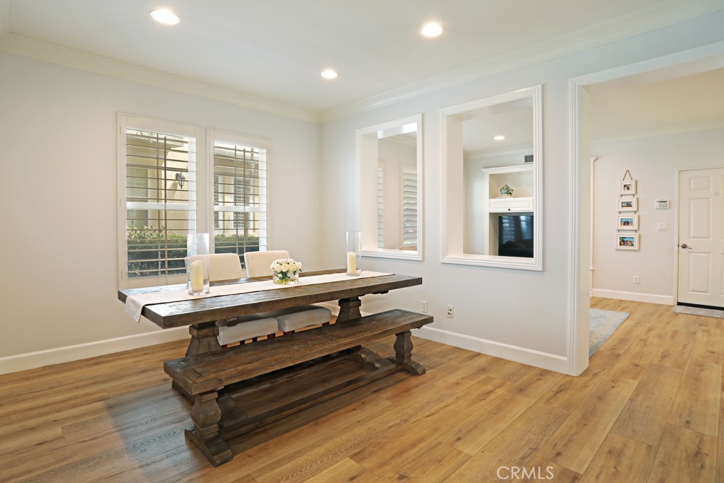 9 Orange Blossom Circle Ladera Ranch, CA 92694 - Photo 7 of 24 a view of a room with wooden floor and furniture