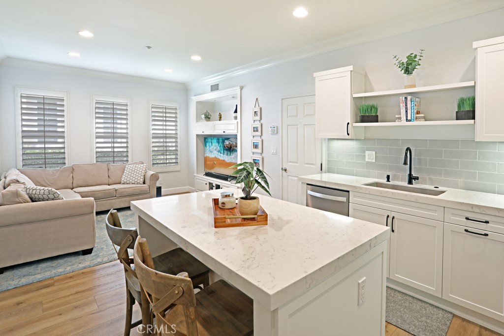 9 Orange Blossom Circle Ladera Ranch, CA 92694 - Photo 10 of 24 a living room with furniture and a table