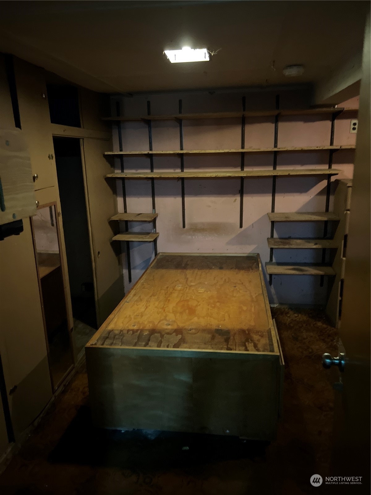 4001 Renton Avenue South Seattle, WA 98108 - Photo 23 of 29 a room with water heater and wooden racks
