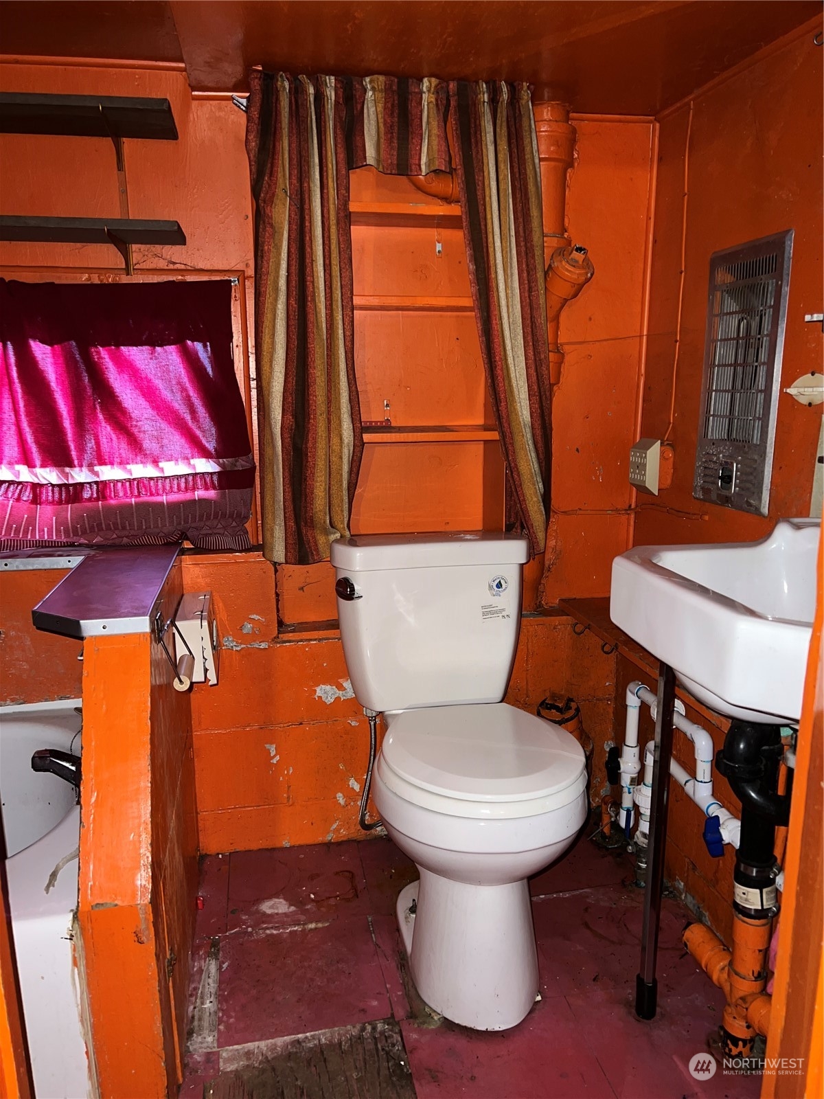 4001 Renton Avenue South Seattle, WA 98108 - Photo 28 of 29 a bathroom with a toilet and a shower