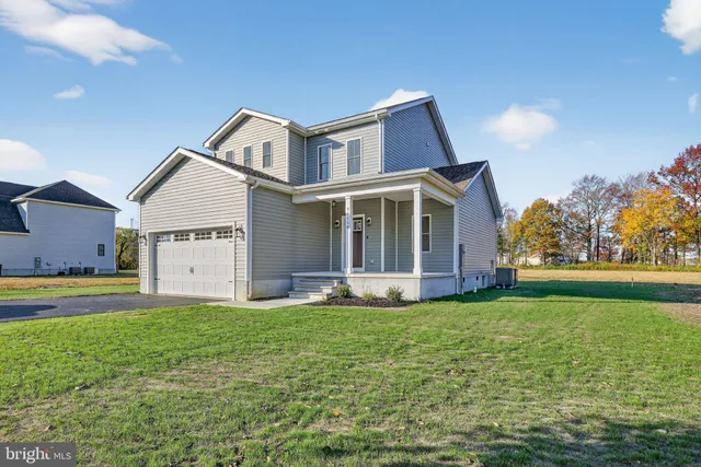 a big house with a big yard and more windows