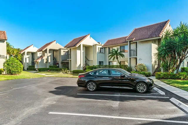 a car parked in front of a house