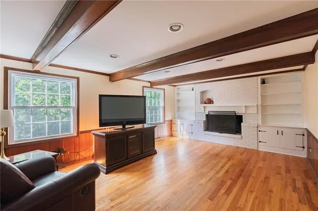 a view of workspace with furniture and window