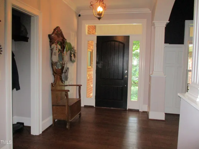 a view of a livingroom with furniture and a window