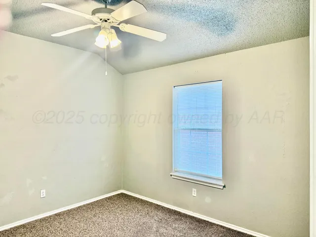 a view of a small space with a fan