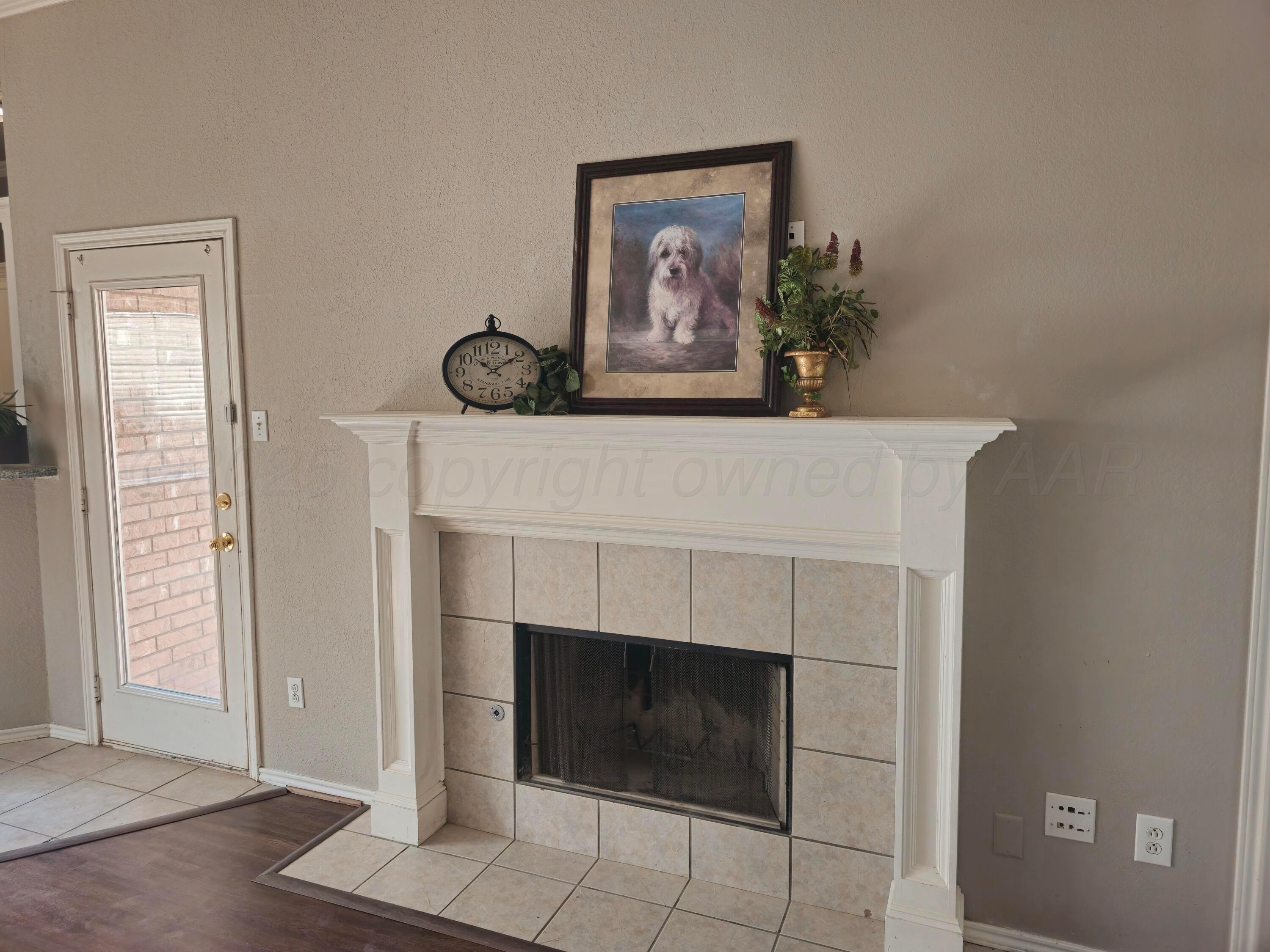 1918 75th Street Lubbock, TX 79423 - Photo 2 of 23 a view of a livingroom with a fireplace