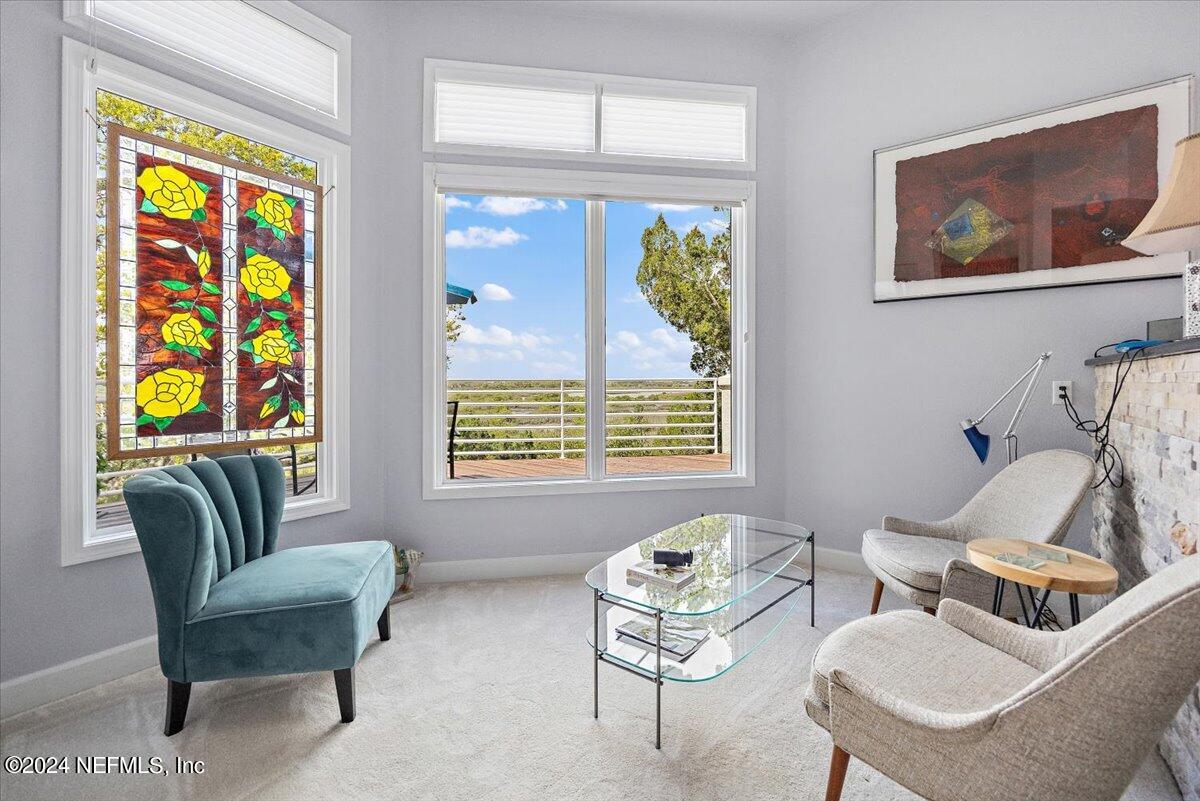 3419 Lands End Drive St. Augustine, FL 32084 - Photo 12 of 59 a living room with furniture and a window