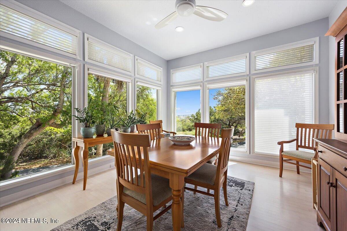 3419 Lands End Drive St. Augustine, FL 32084 - Photo 20 of 59 a dining room with furniture window wooden floor