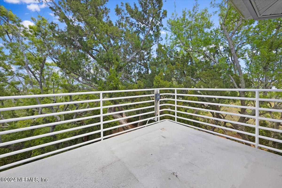 3419 Lands End Drive St. Augustine, FL 32084 - Photo 23 of 59 a view of a garage with an outdoor space