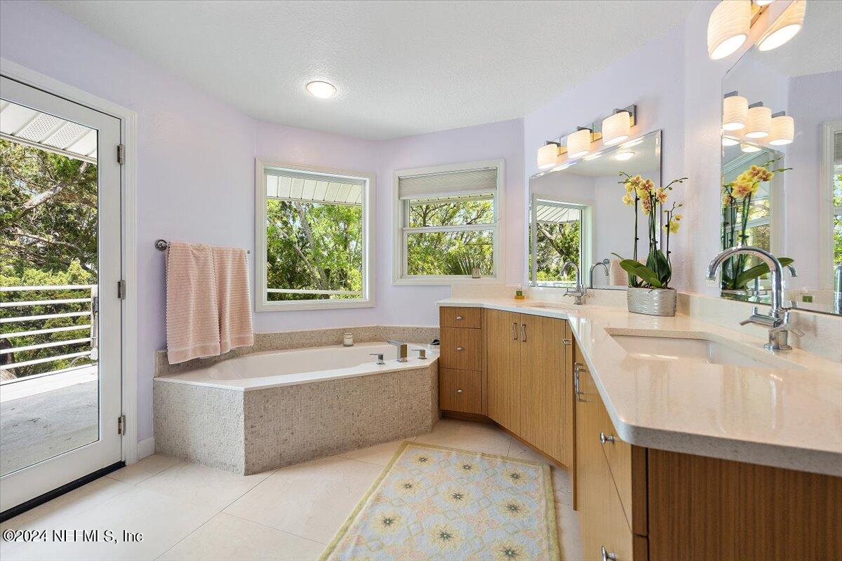3419 Lands End Drive St. Augustine, FL 32084 - Photo 31 of 59 a spacious bathroom with sink shower and bathtub