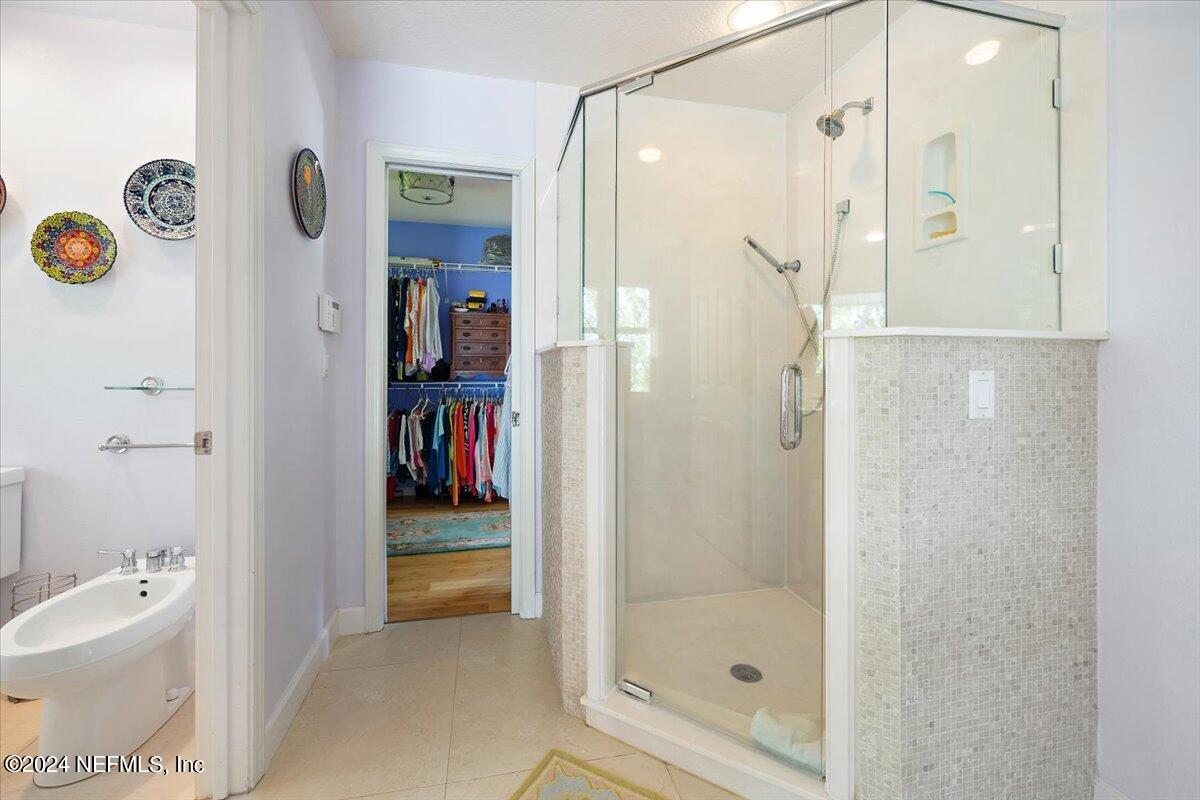 3419 Lands End Drive St. Augustine, FL 32084 - Photo 32 of 59 a bathroom with a bathtub and a shower