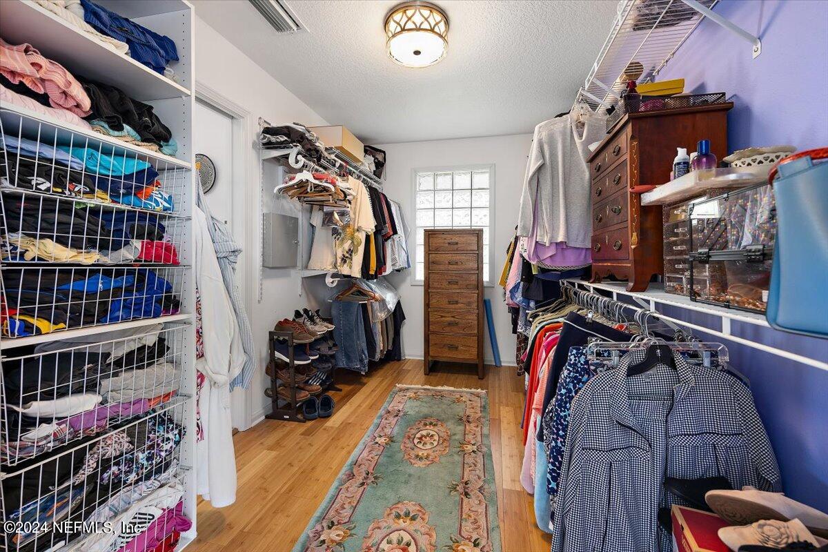 3419 Lands End Drive St. Augustine, FL 32084 - Photo 33 of 59 a view of walk in closet with clothes and shoes