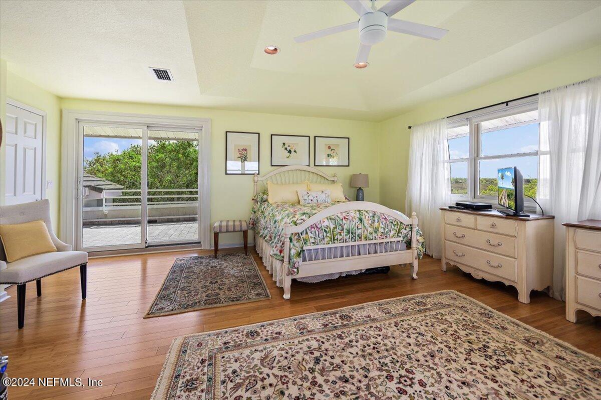 3419 Lands End Drive St. Augustine, FL 32084 - Photo 37 of 59 a living room with a bed furniture and a window