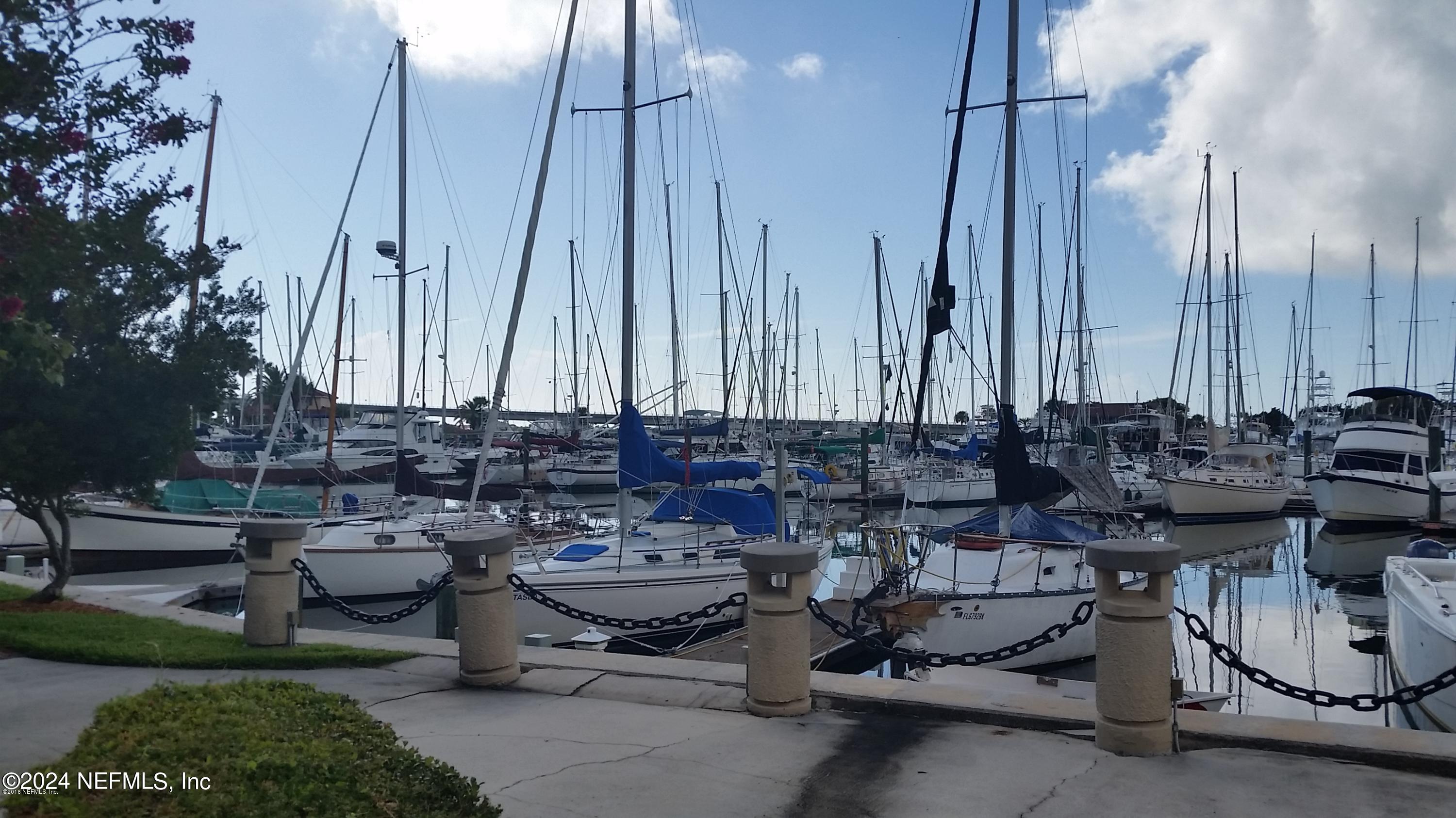 3419 Lands End Drive St. Augustine, FL 32084 - Photo 56 of 59 a view of a chairs and table in the backyard