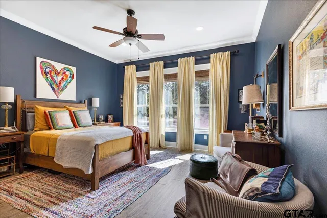 a bedroom with a bed and a couch