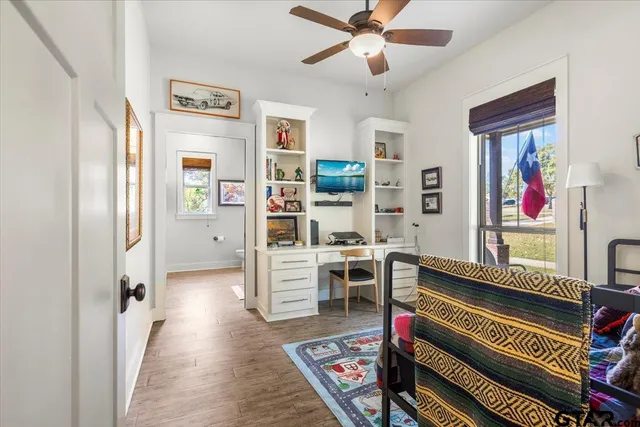 a room with furniture and wooden floor