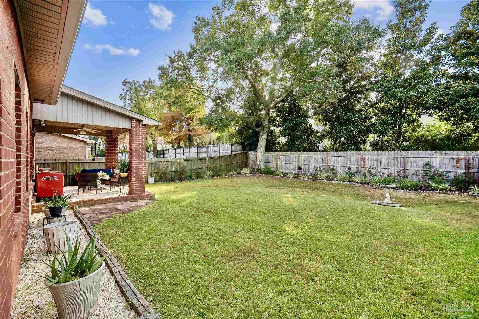 745 Farmington Road Pensacola, FL 32504 - Photo 4 of 25 a view of a backyard