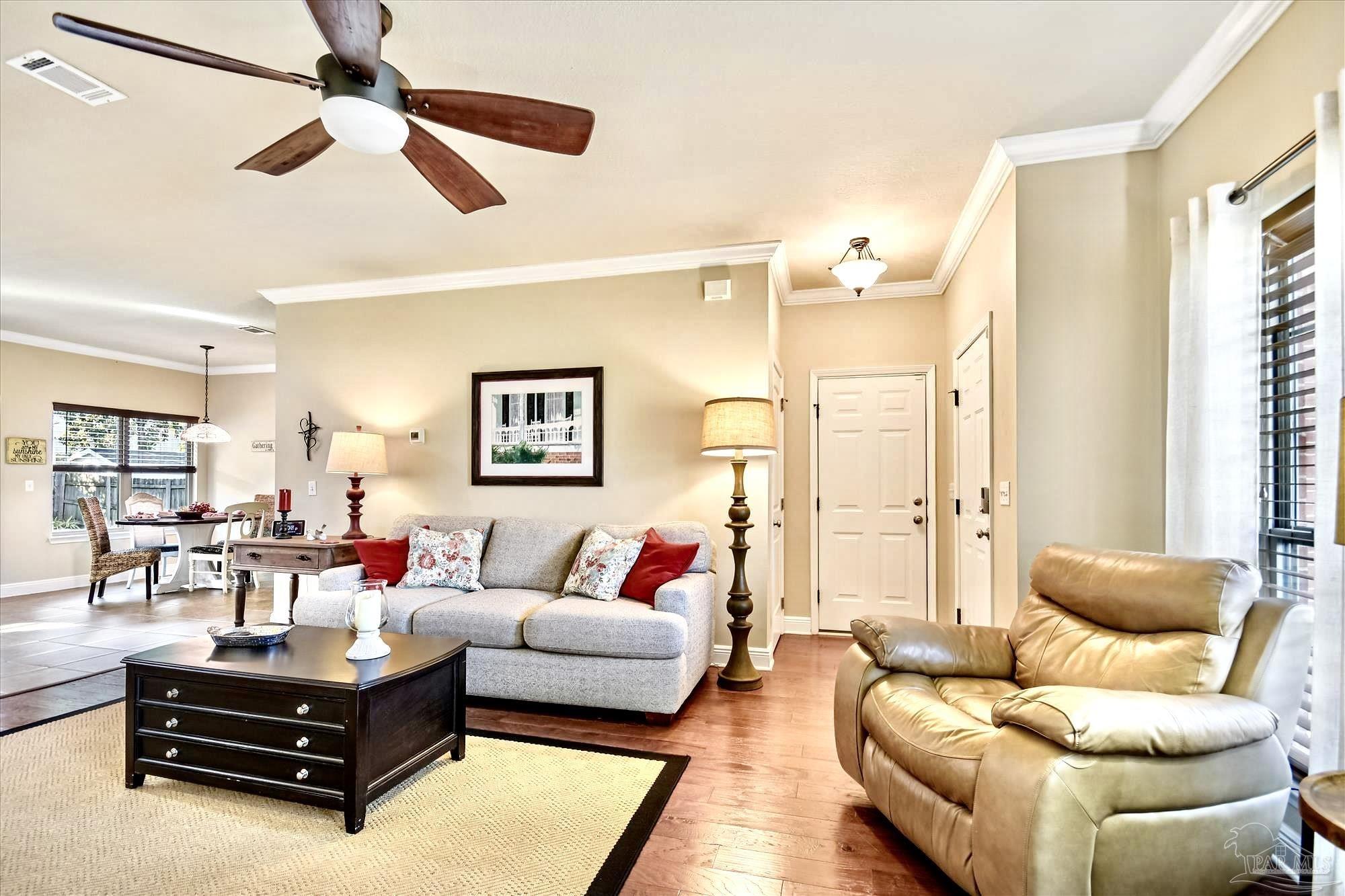 745 Farmington Road Pensacola, FL 32504 - Photo 7 of 25 a living room with furniture and a large window