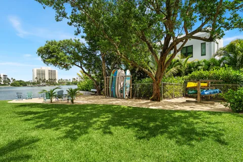 a house view with a sitting space and garden
