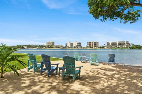 a view of a chairs and table in a patio