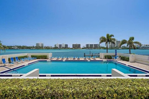 a view of a swimming pool and lake view