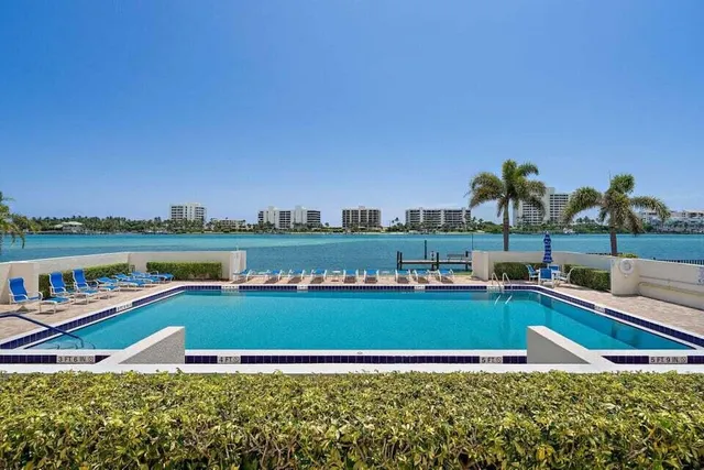 a view of a swimming pool and lake view