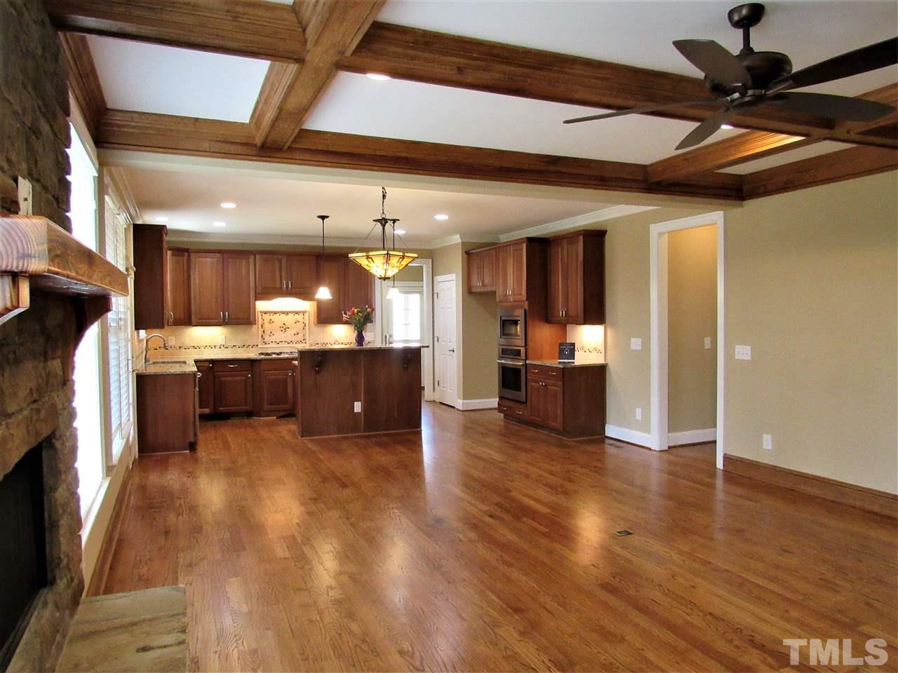 3604 Arthur Pierce Road Apex, NC 27539 - Photo 30 of 30 Another set of Coffered Ceilings*Brilliant FP with gas logs. Open floorplan that is great for entertaining!