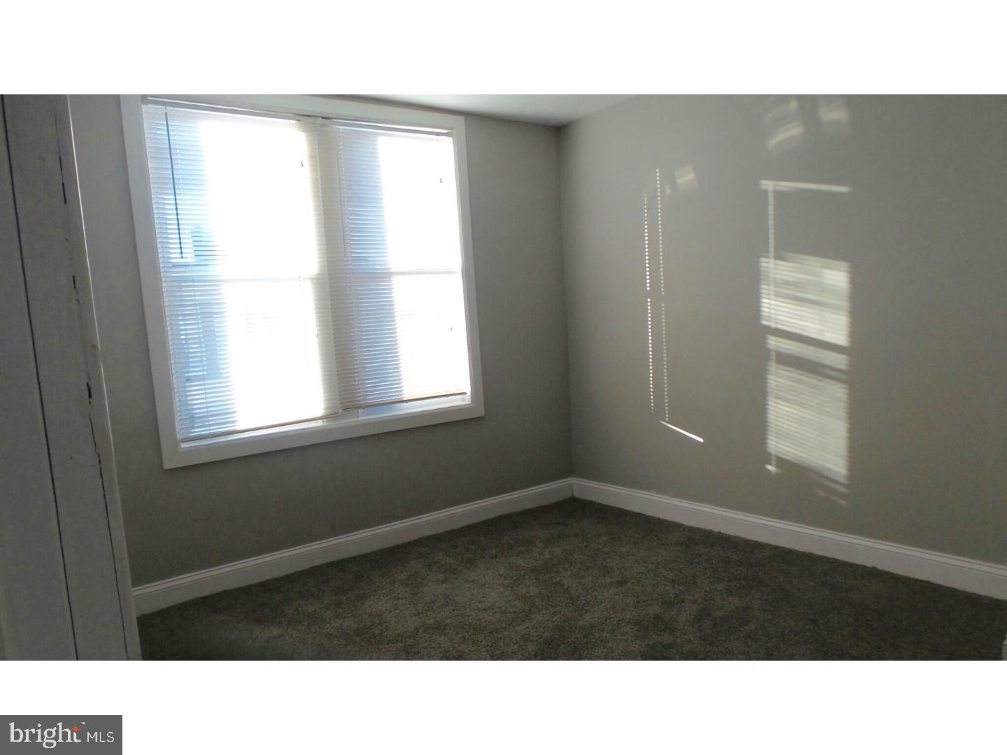 1640 South 28th Street Philadelphia, PA 19145 - Photo 12 of 24 a black and white photo of a living room