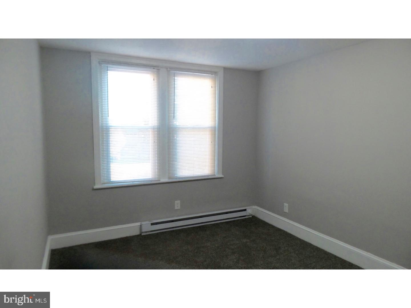 1640 South 28th Street Philadelphia, PA 19145 - Photo 13 of 24 a black and white photo of a living room