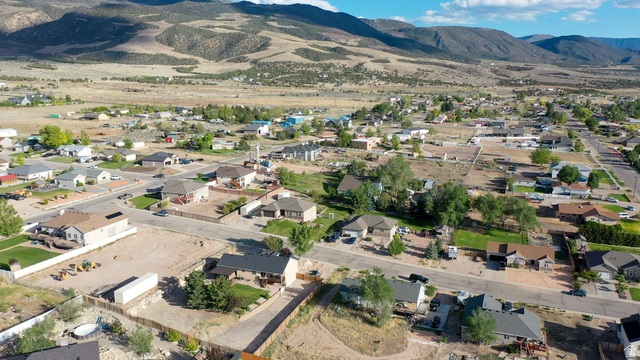1797 Sunset Road Enoch, UT 84721 - Photo 70 of 80 Expansive aerial perspective showcasing a residential neighborhood with diverse architectural styles