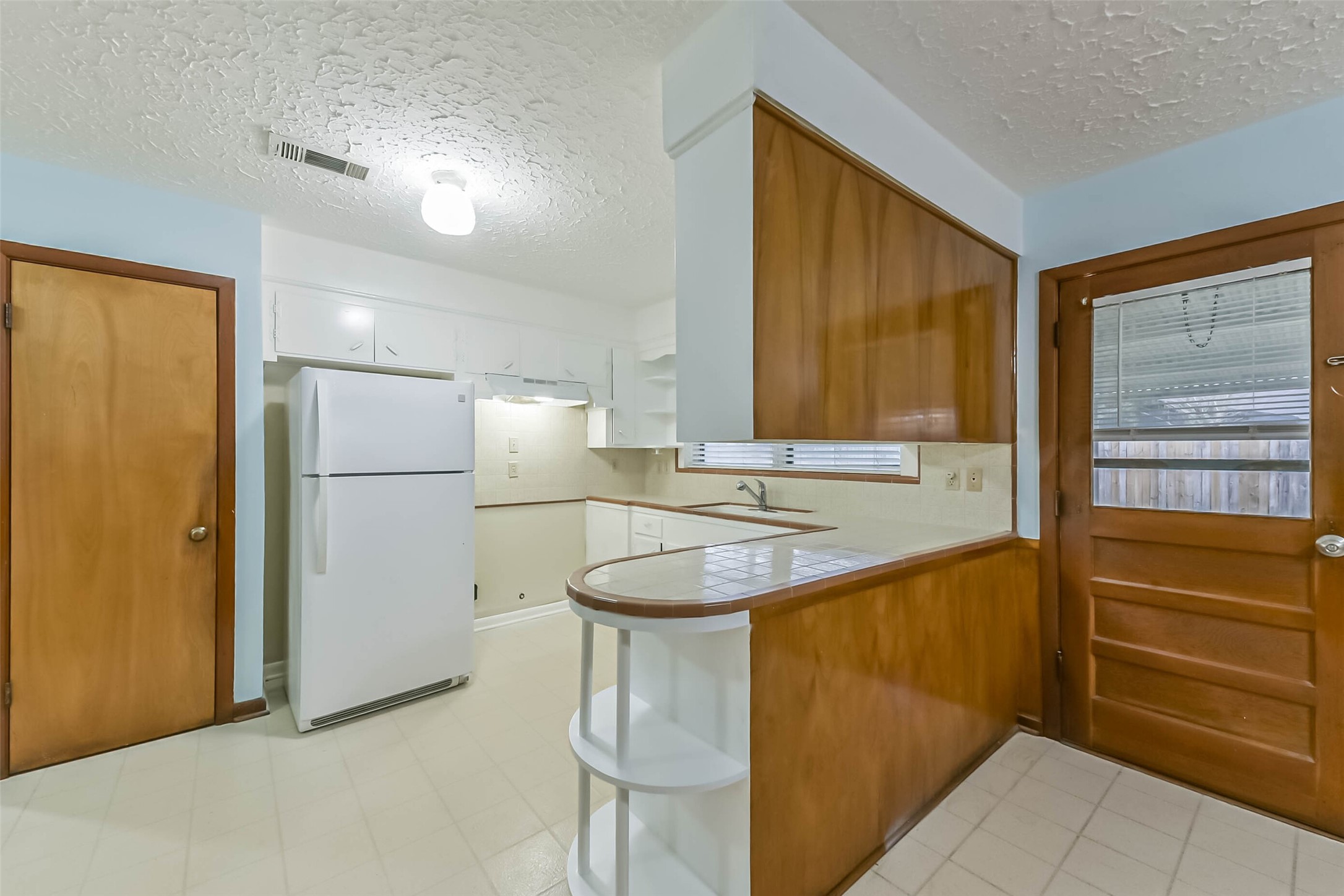 705 Dunwick Lane Pasadena, TX 77502 - Photo 11 of 27 a bathroom with a sink and a mirror