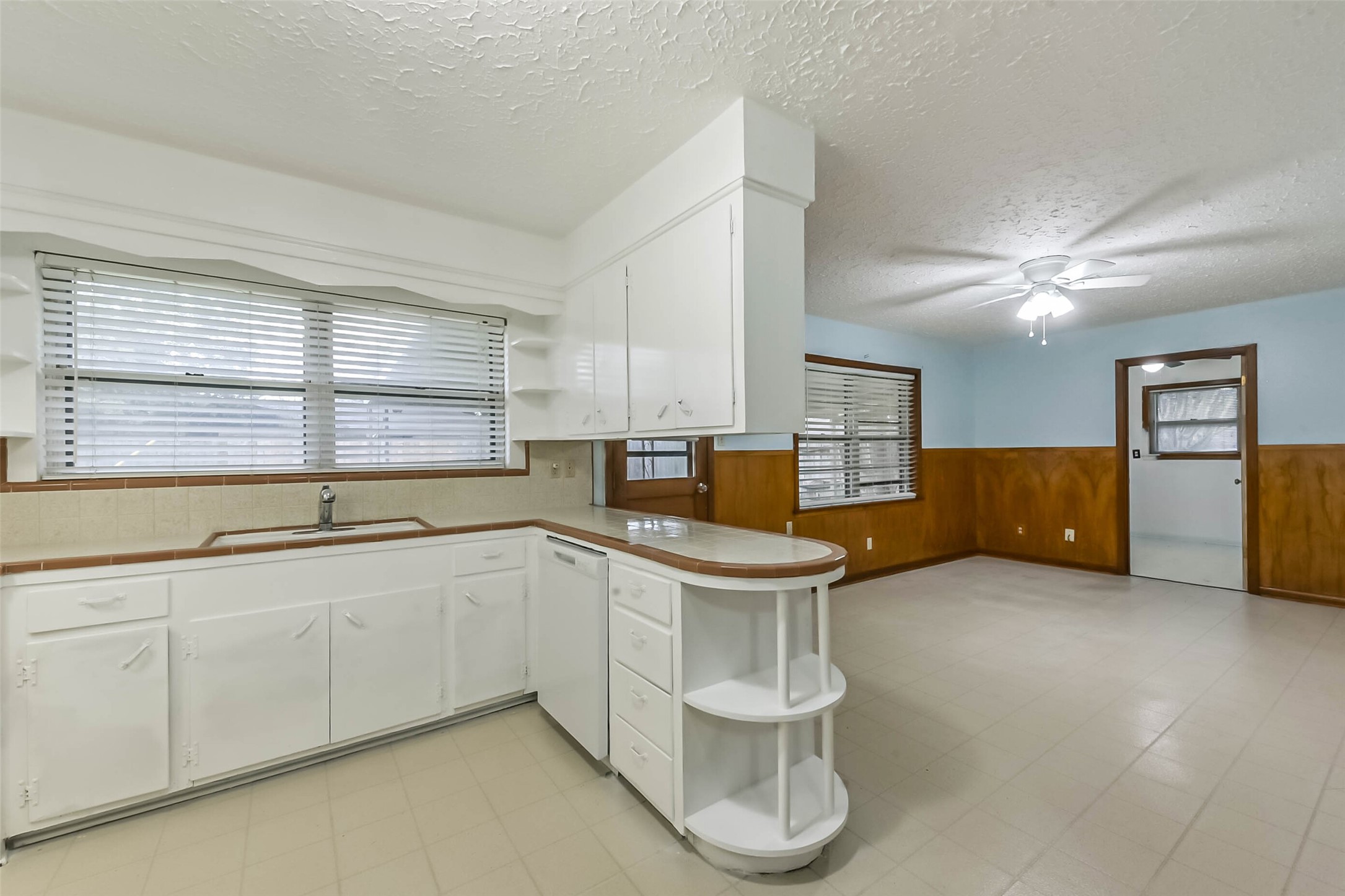 705 Dunwick Lane Pasadena, TX 77502 - Photo 8 of 27 a kitchen with a sink and cabinets