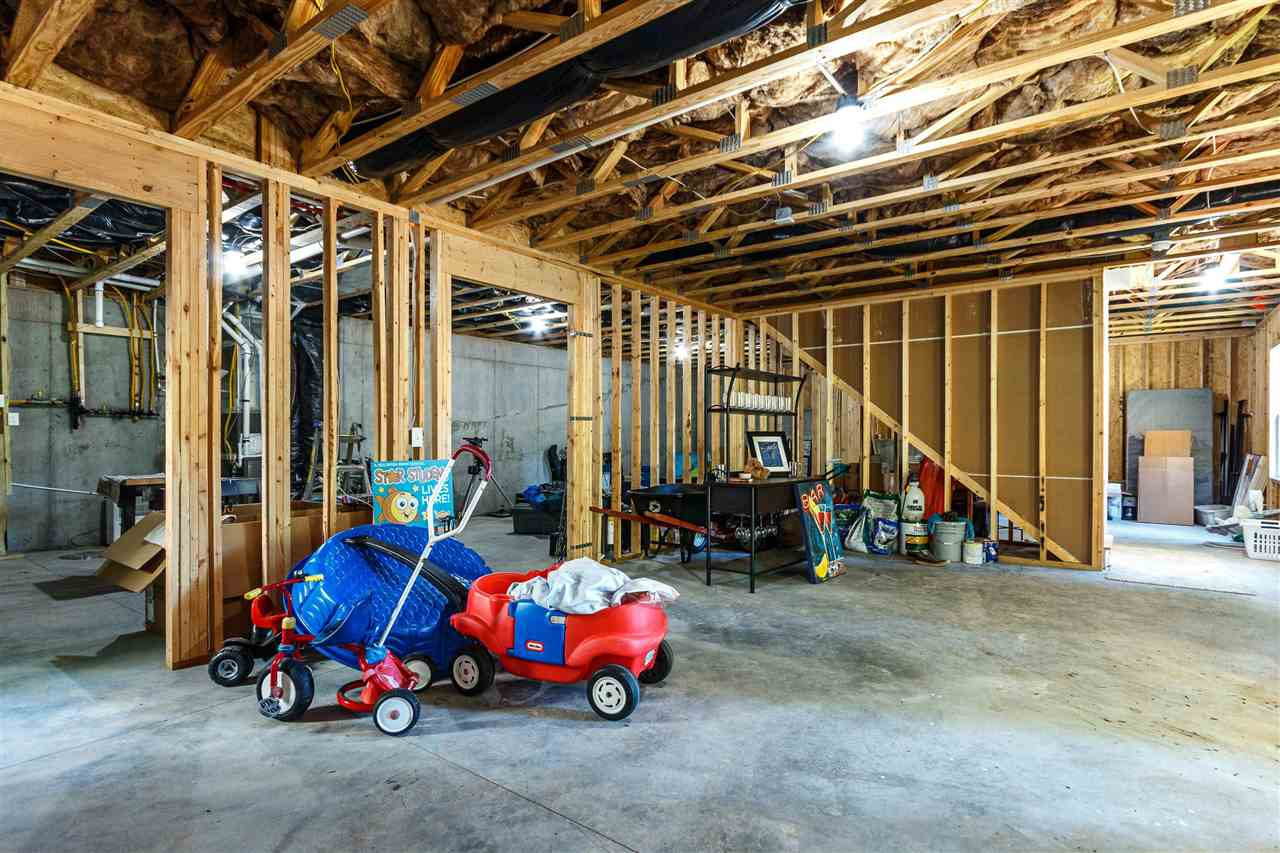 1827 Arlington Street Raleigh, NC 27608 - Photo 26 of 30 Partitioned for bedrooms, office, living area, wet bar and plumbed for bath. OVER 1400 square feet of space. Unfinished Basement