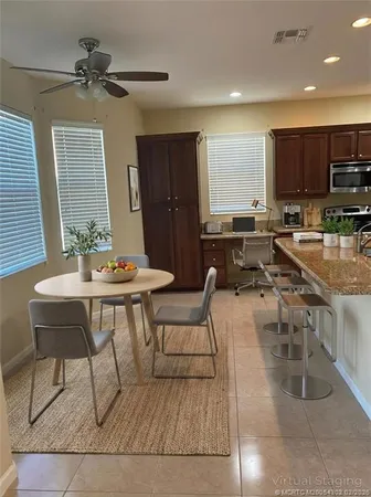 a view of a dining room with furniture