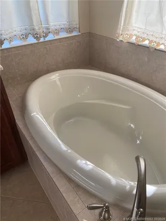 a bath tub sitting in a bathroom