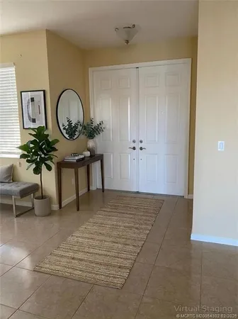 a view of living room and wooden floor
